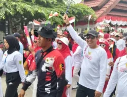 Bupati Luwu Utara Lepas Ribuan Peserta Jalan Sehat HUT ke-80 RI